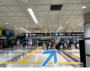 Photos of the ticket gate and an arrow