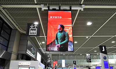 Photo of the large LED vision in the departure lobby of the second terminal