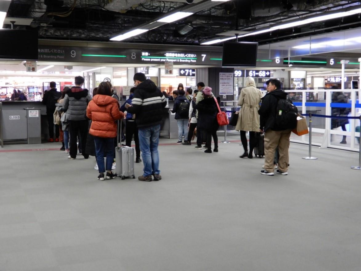 A photo of the departure inspection counter at Terminal 2